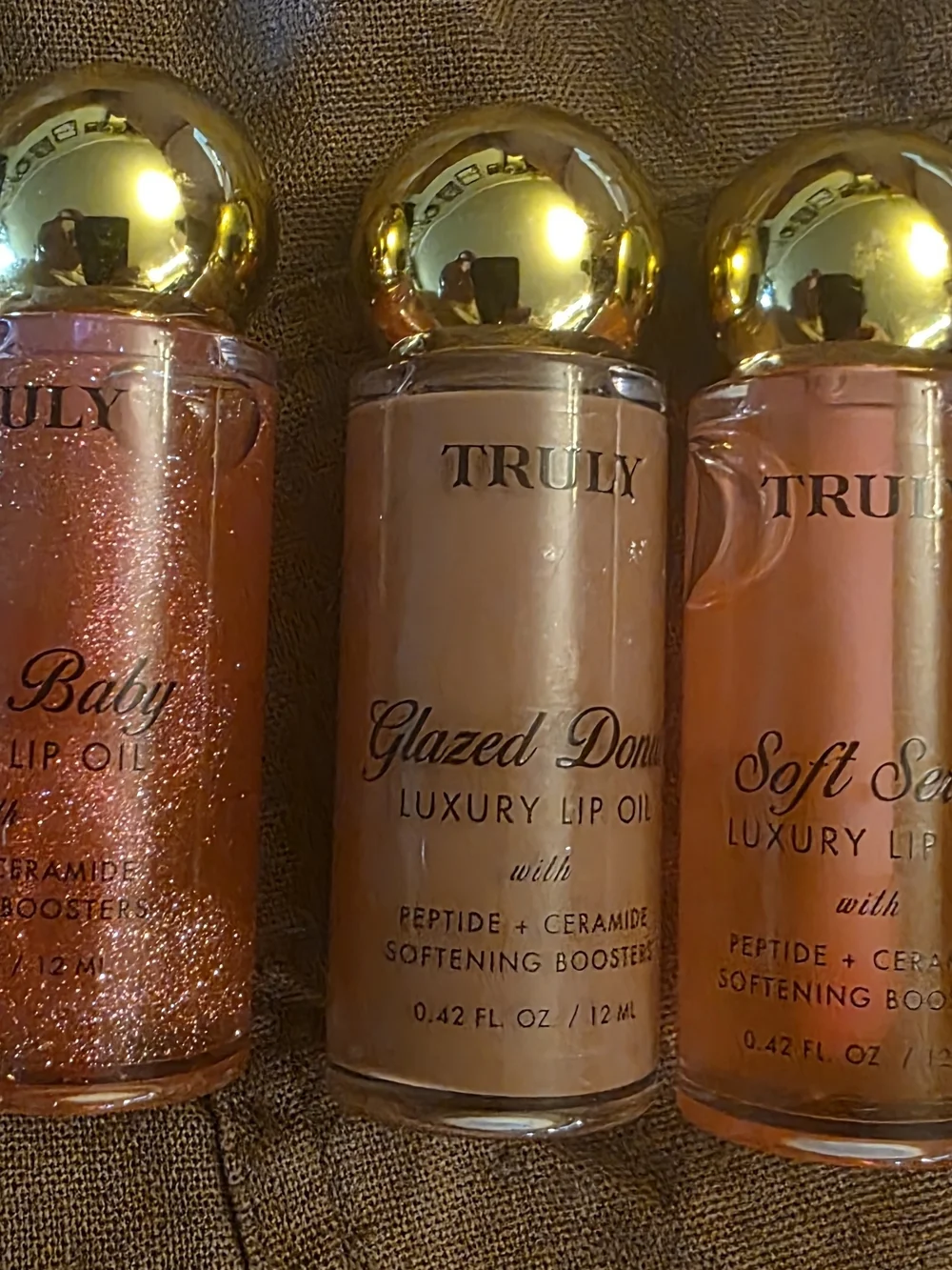 TRULY Lip Oil Set in Shimmery Copper, Nude Beige, and Peach
